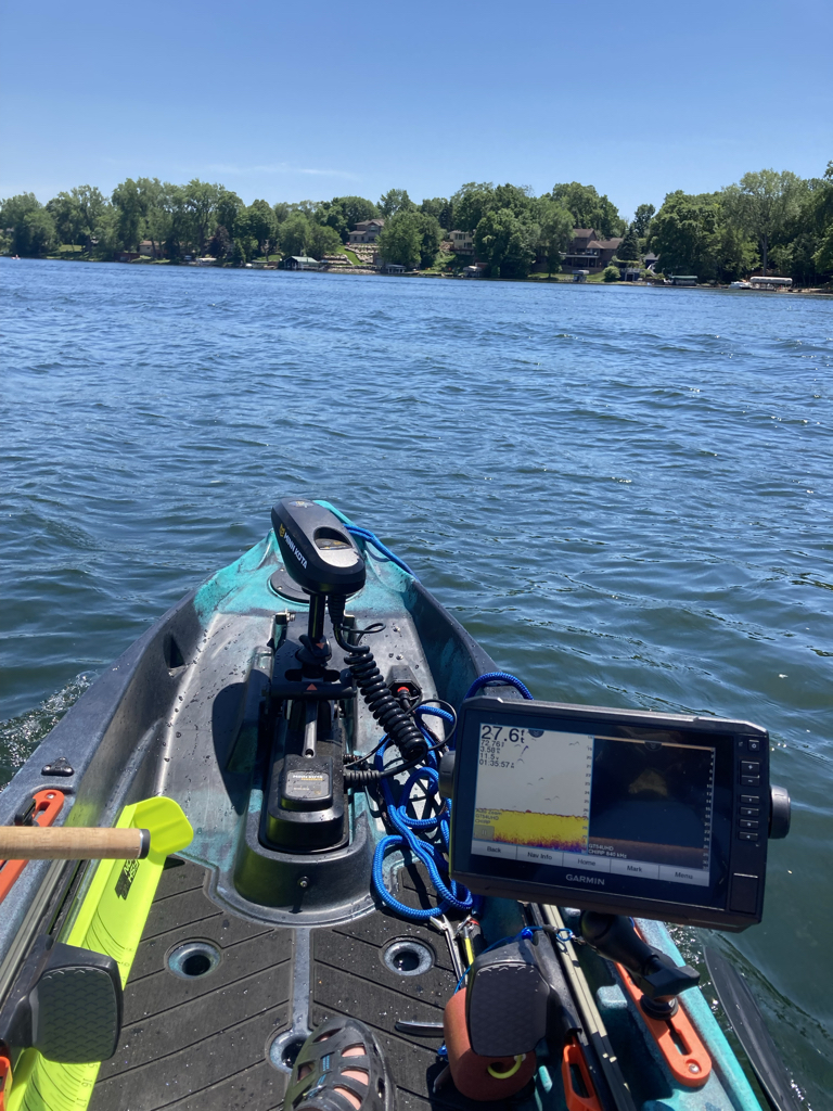 Fishing in my kayak on Crystal Lake, MN.