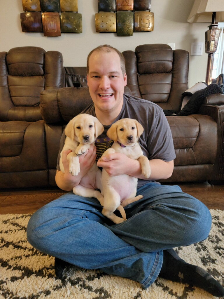 Chris holding Willow and Remy